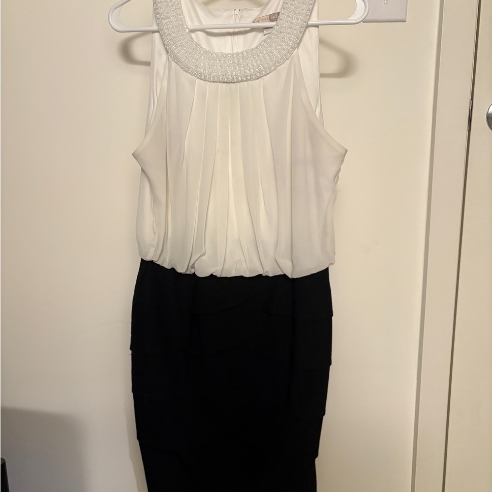 Elegant Black and White Sleeveless Dress